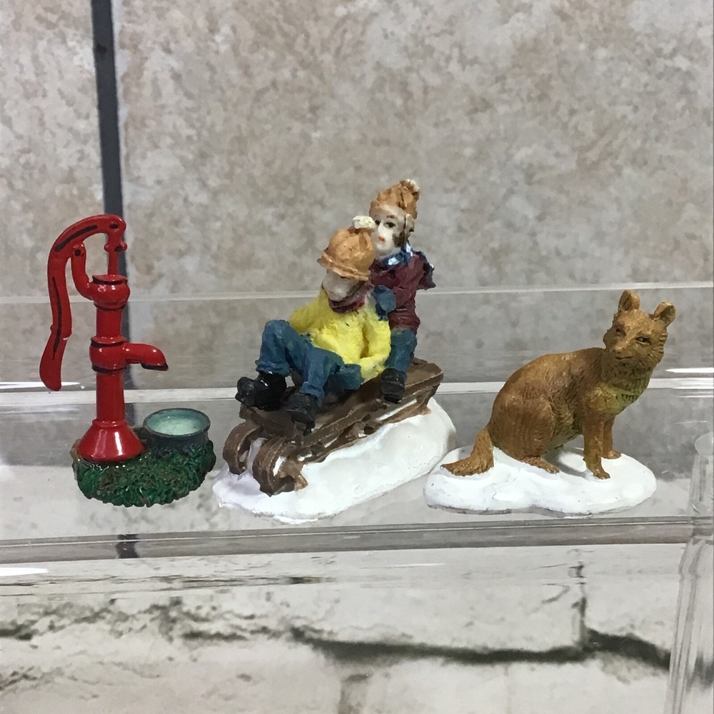 Christmas Village Figures Assorted Lot Of 3 Water Pump Dog Children Sledding